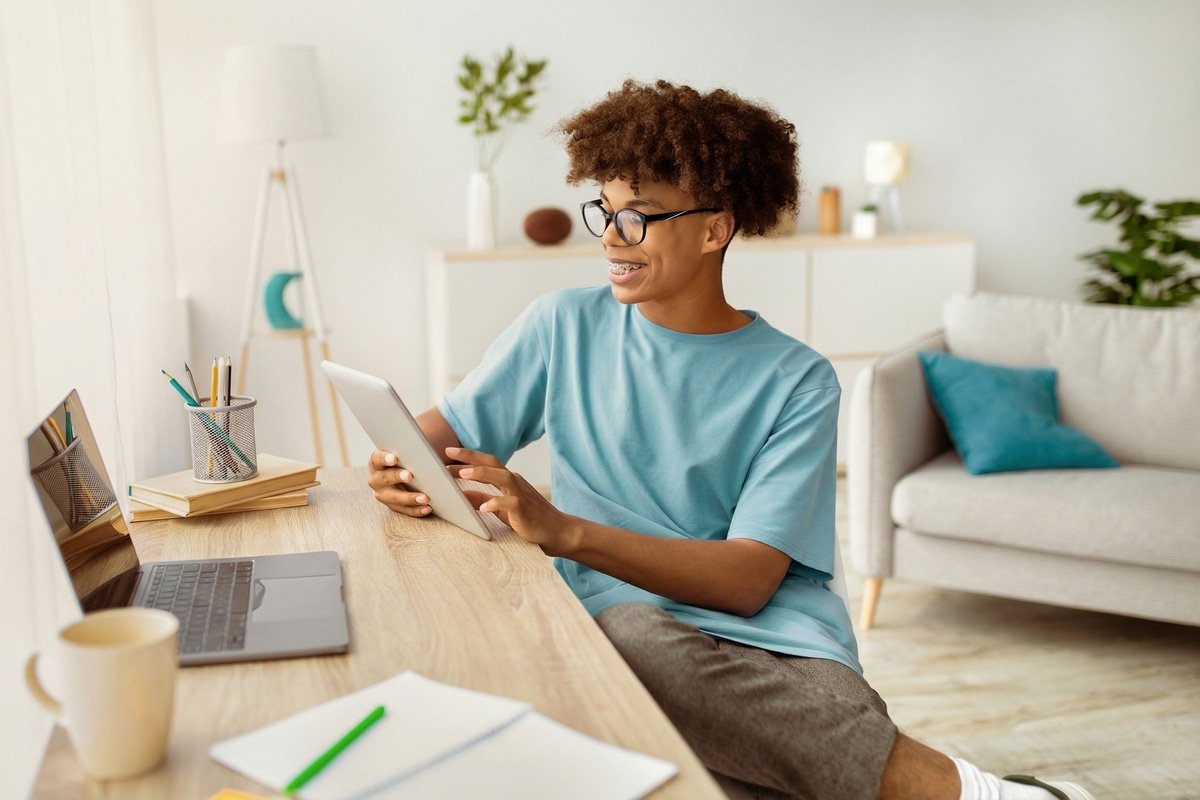 Student using a tablet at home